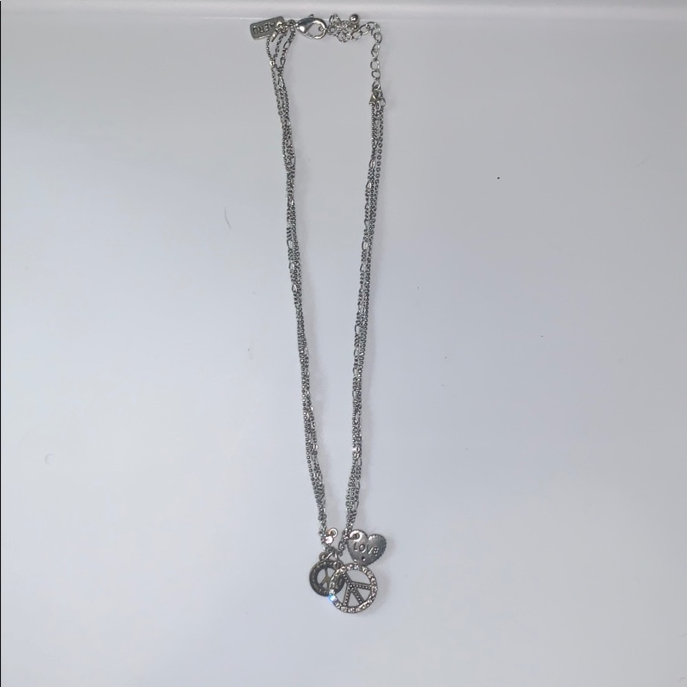 A 4 charmed silver necklace